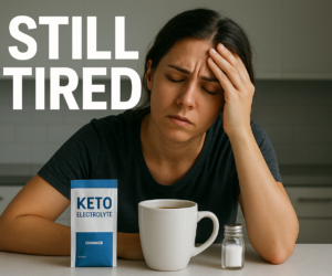 Tired person at a kitchen counter with an electrolyte packet, broth mug, and salt shaker beside bold text Still Tired?