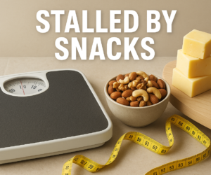 Bathroom scale with nuts, cheese, and measuring tape nearby and bold text Stalled by Snacks